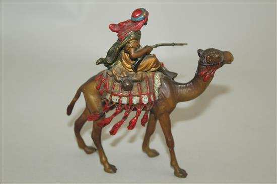 An Austrian cold painted bronze figure of an Arab fighter riding a camel, 5.5in.